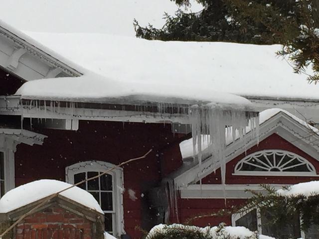 Heat Escaping From the Attic Forms Ice Dams