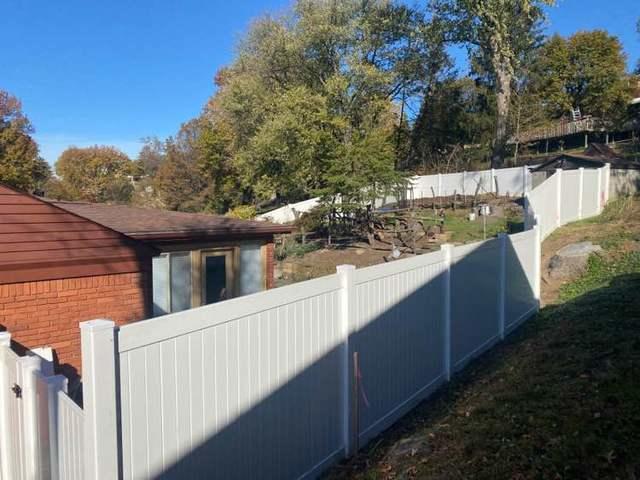 6' White Vinyl Acadia Privacy Fence (1) 3' gate / (1) 4' gate backyard Installation
