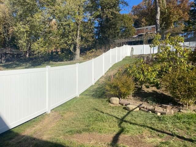 6' White Vinyl Acadia Privacy Fence (1) 3' gate / (1) 4' gate backyard Installation