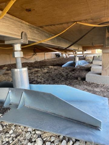 These structural support jacks will be keeping this sun deck supported for years and years.