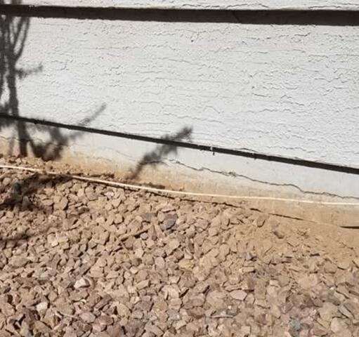 Symptoms of Stem Wall Failure: Horizontal Concrete Cracks