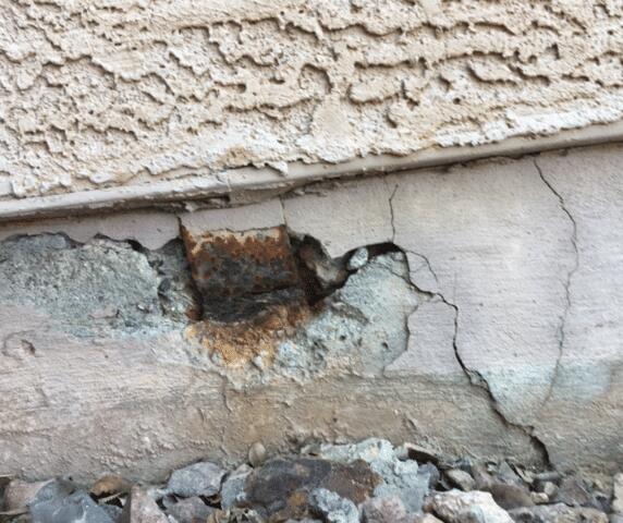 Stem Wall Failure Signs: Oxidized Tie-down Straps in Goodyear, AZ