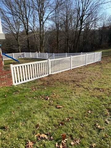 42" White Biscayne Vinyl Fence (1) 3' gate / (1) 5' gate in Backyard