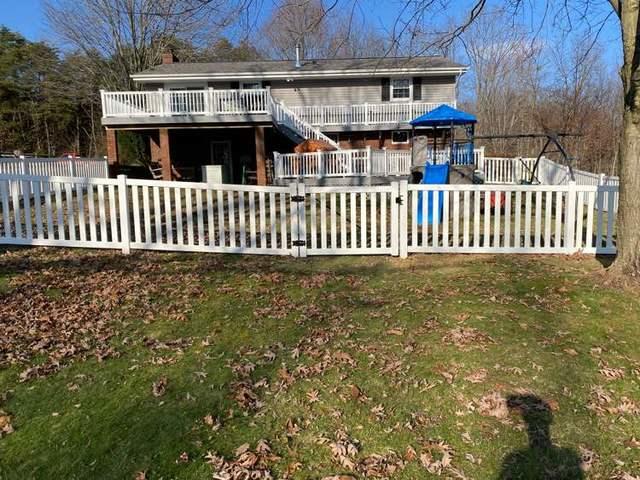 42" White Biscayne Vinyl Fence (1) 3' gate / (1) 5' gate in Backyard