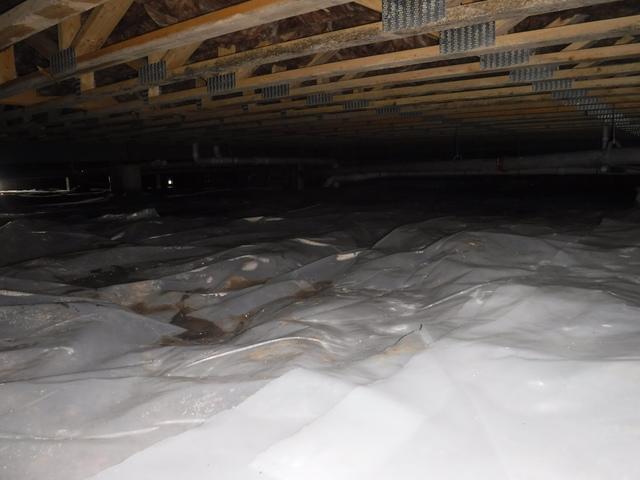 Torn Vapor Barrier in Lewes, DE Crawl Space