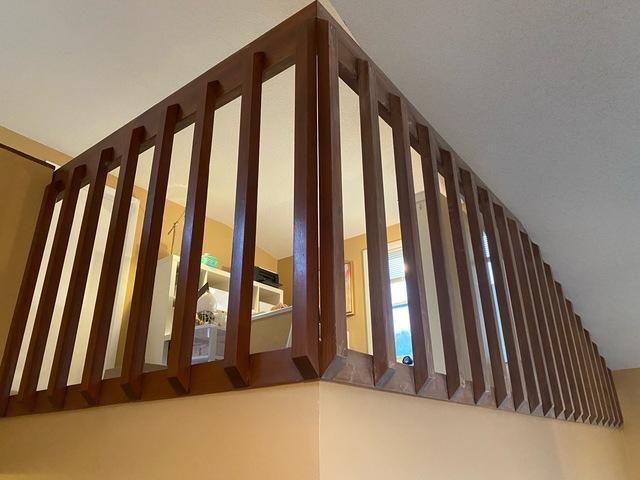 This railing looks outdated, it is time for some fresh paint!