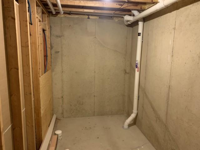 This is the extraction point that was installed with the drain tile system. This is creating negative pressure throughout the entire drainage system located under the slab.