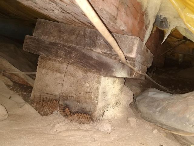 Old Wooden Supports Sinking and Settling Causing Settling Floors in Hibbing, MN Home