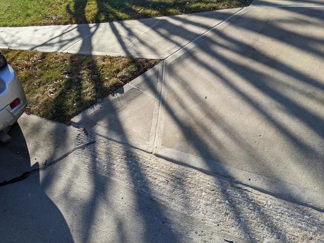 Using the same two processes, the sidewalk was leveled to match the driveway and create a safe walking surface for its users.