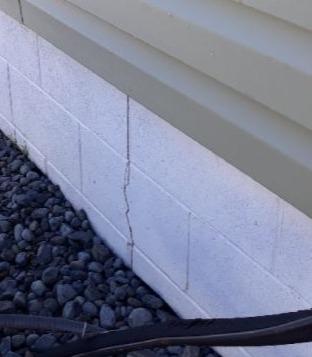 Soil Causes Cracks in Walls in Hibbing, MN Basement