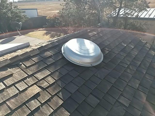 This is the old wood shake roof before we replaced it.