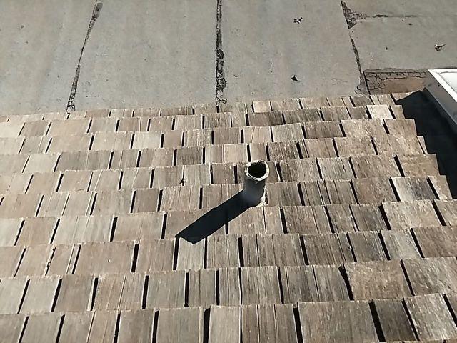 This is the old wood shake roof before we replaced it.