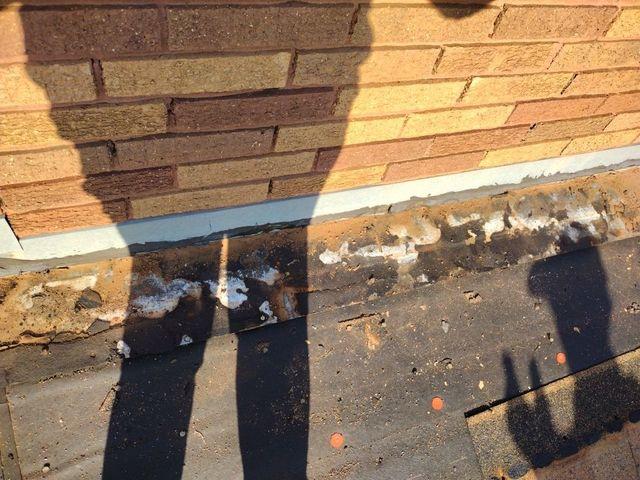 During the tear-off of the old roof.