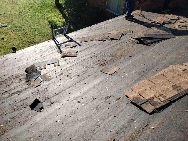 During the tear-off of the old roof.