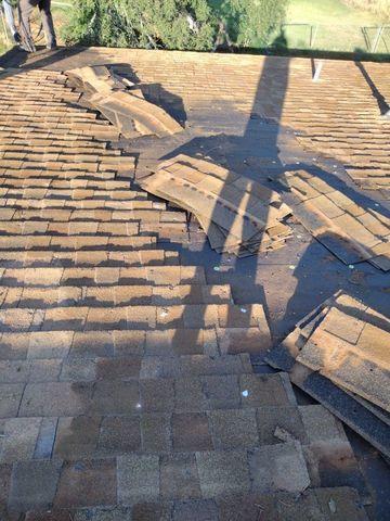 During the tear-off of an old roof.