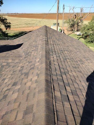 We replaced our Client's roof with IKO Dynasty Laminated Shingles, Shadow in color.