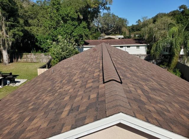 <p>A new shingle roofing system in the color Owen's Corning Brownwood, in Temple Terrace, Florida.</p>