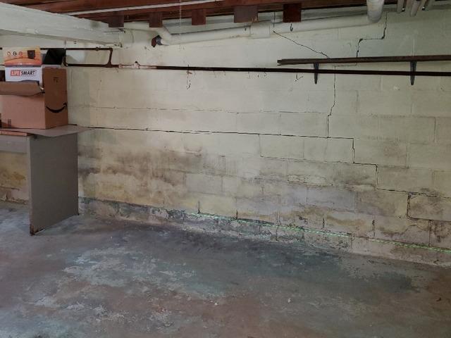 Leaky Cracked Walls Cause Mold Growth in Basement