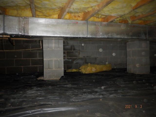 Fallen Insulation and Wet Block Foundation