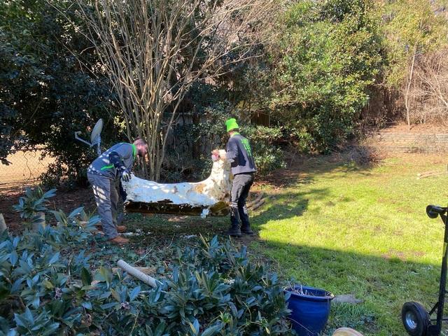 The Junkluggers of Atlanta Metro East team hauling sections of the hot tub that was just demolished. Our team loves taking care of our customers!