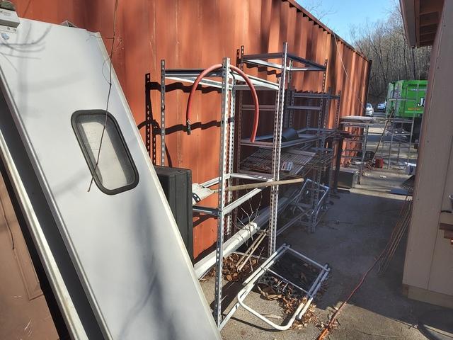 There were swinging doors, shelving, and other assorted components from a restaurant to be removed.