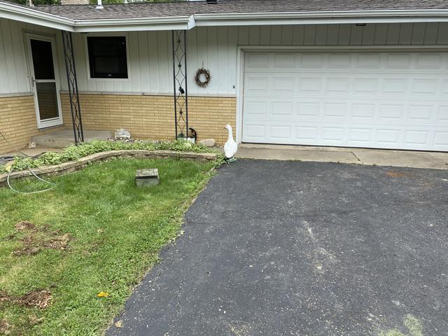 Removed wagon, boxspring mattress, table, chair, shelves