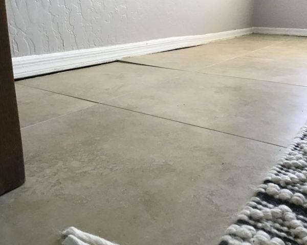 Gaps at the Baseboards & Popping Tile