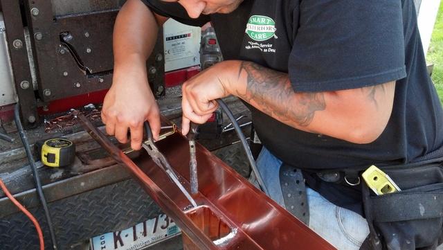 Here Dave is soldering a copper outlet in Danbury, CT