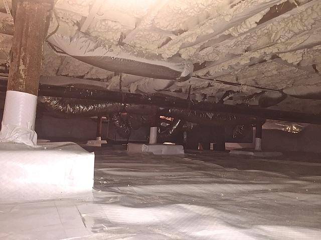Even with obstacles in the way out team was able to Spray Foam Insulation.