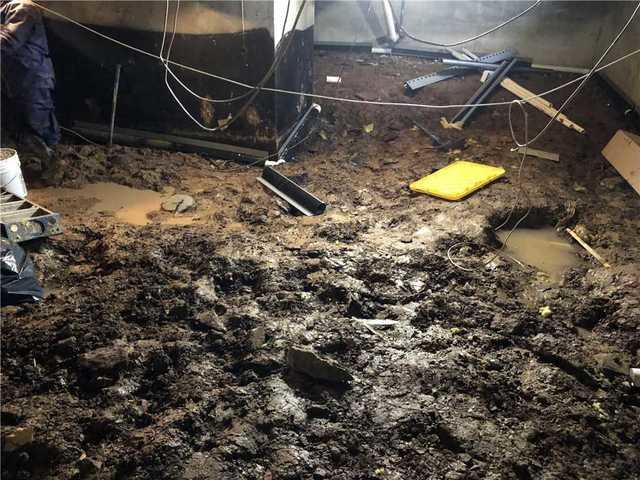 Muddy crawl space