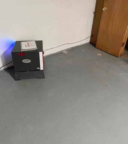 Energy-efficient SaniDry Sedona dehumidifier installed in the basement to transform the environment into a cleaner and healthier space