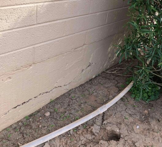 Signs of Corrosion Problems in a Concrete Stem Wall: Horizontal Concrete Cracks