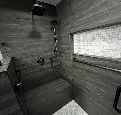 There was some concern if the bronze edging was going to compliment the dark tiles, but it is the perfect accent!