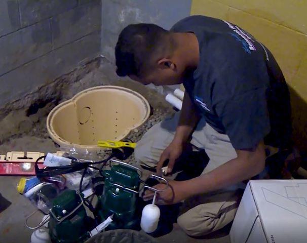 Our Foreman Sai Installing a Sump Pump