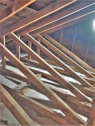 Previous Insulation in Hermantown, MN Home is Removed to Air Seal Attic