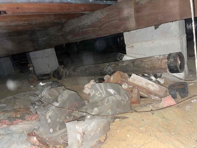 Mold and mildew have formed along the floor joists of the crawl space. This can occur on any organic materials when the relative humidity of the crawl space reaches over 60% during warmer temperatures. Mold spores can rise up into the home and cause irritation for those with allergies or asthma.