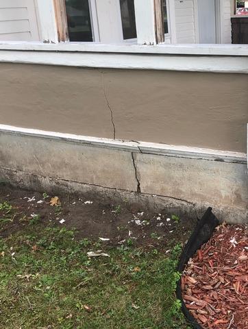 Sinking Front Porch with Cracks Indicates Foundation Settling