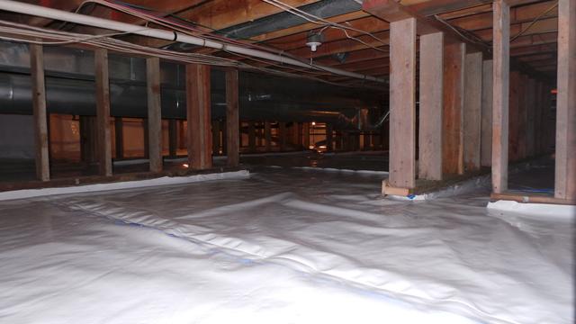 <p>This fully conditioned crawlspace is now a dry storage area for the home.</p>