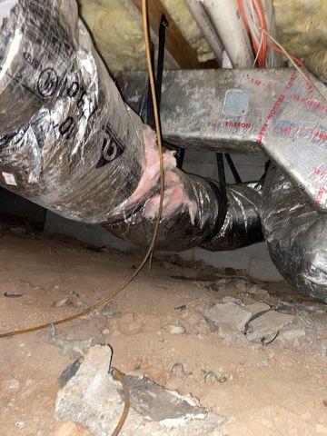 This dirt floor vented crawl space needs some TLC.