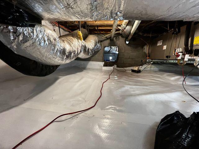 CleanSpace is installed on the dirt crawl space floor. Underneath this CleanSpace liner is dimple matting followed by Terrablock.