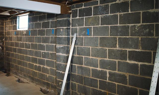 The basement walls were bowing inwards and a horizontal crack was forming, so the homeowner contacted Quality 1st Basement Systems for a solution.