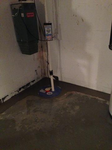 This shows the plumbing we put in place with the SuperSump system to take the water out of your basement and make you worry free during the next rain storm!