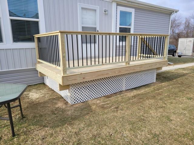 New treated wood deck in Grass Lake