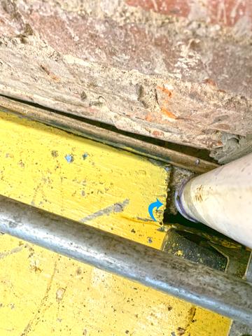 We found rodent droppings in several areas of the warehouse. When we investigated, we found several utility pipes that had large gaps around them.