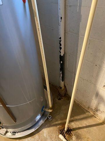 This PVC pipe was used to move water from one area in the basement to another.  This can easily clog, back up and create more water problems.  If the water in the drain backs up, this area could flood.