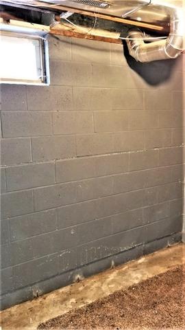 Pressure From Outside Soil in Cook, MN Causes Basement Wall to Crack