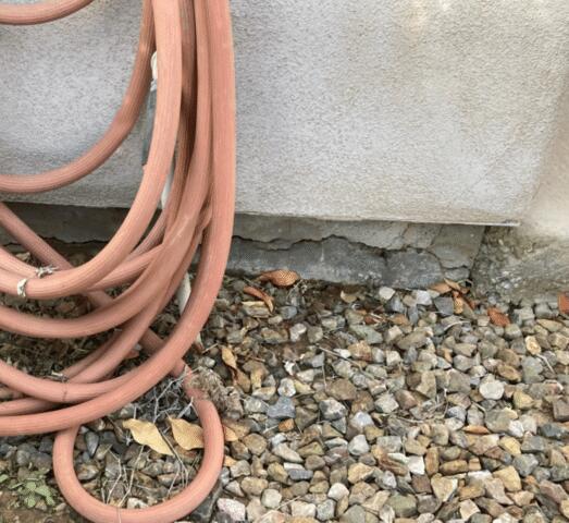 Sings of a Failing Stem Wall: Spalling Concrete