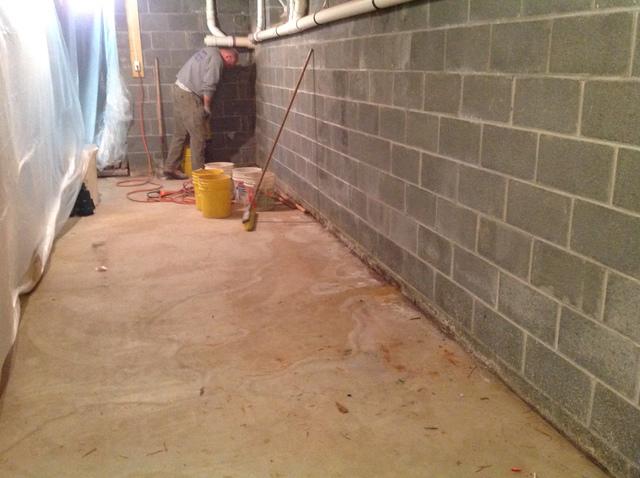 You can see that there are water stains on the floor showing this home has had a water problem.  Once we get done here, this basement will be dry for the rest of its life.