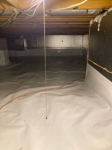 After SilverGlo wall panels are installed to insulate the crawl space, the temperatures are better controlled.  Clean space installed across the dirt floor controls any moisture or wetness below.