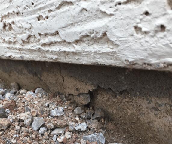 Signs of Corrosion Problems in Stem Wall: Spalling Concrete